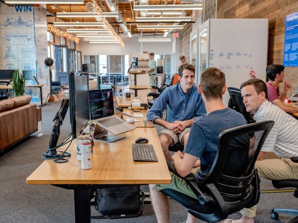 Developers collaborating in a modern office